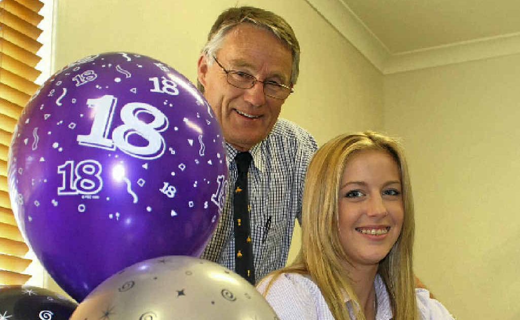 LONG HISTORY: Izzy Thorley celebrated her 18th birthday on Wednesday with the doctor who welcomed her into the world, John Kiss. LONG HISTORY: Izzy Thorley celebrated her 18th birthday on Wednesday with the doctor who welcomed her into the world, John Kiss.